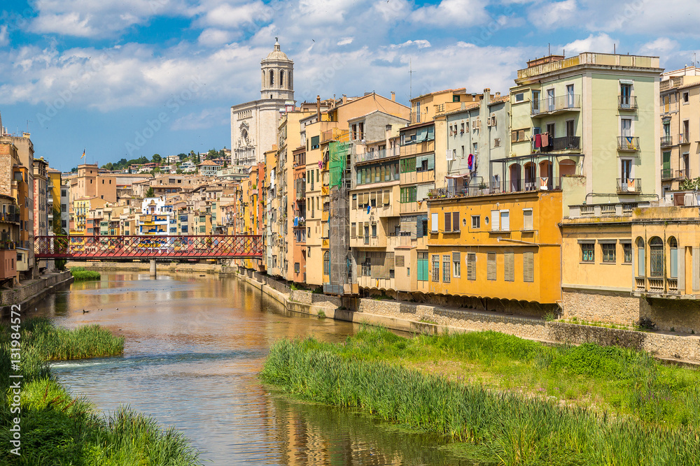 Colorful houses and Eiffel bridge in Girona Colorful houses and Eiffel bridge in Girona