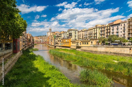 Colorful houses and Eiffel bridge in Girona © Sergii Figurnyi