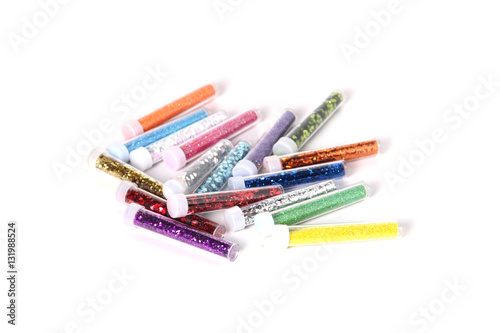 Multicolored glitter in bottles