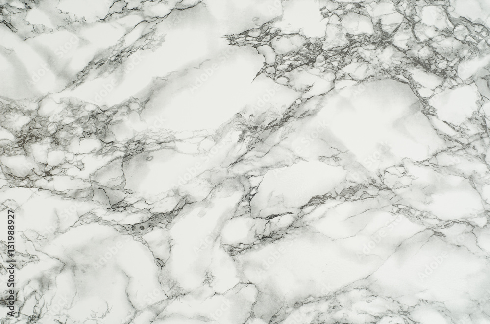 Top view of a white, detailed structure of marble stone