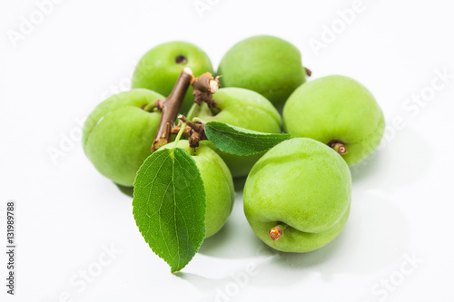 Green plum korean fruits with leaves