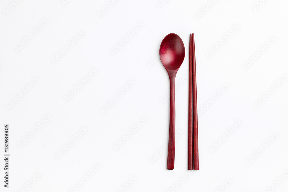 Wood spoon and chopsticks on white background Wood spoon and chopsticks on white background