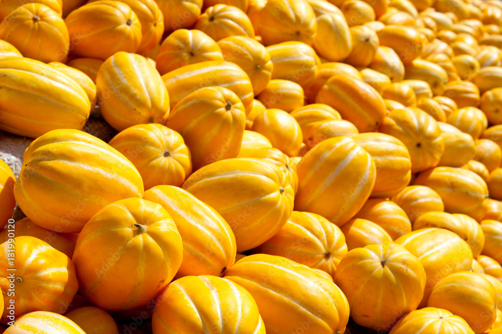 Yellow Korean melon in a bulk for background in korea Yellow Korean melon in a bulk for background in korea