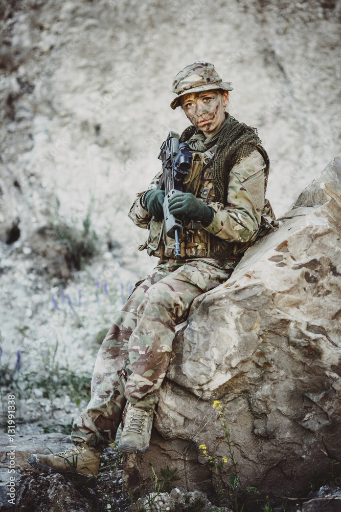 Fototapeta premium Army sniper during the military operation in the mountain. war,