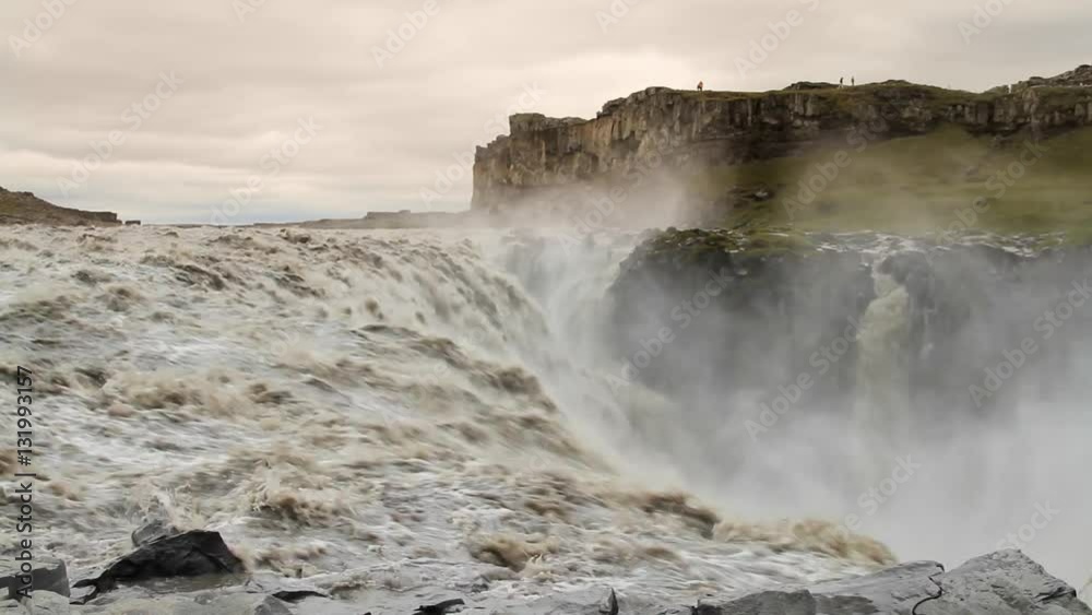 Dettifoss is a waterfall in Vatnajökull National Park in Northeast Iceland, and is the most powerful waterfall in Europe. The falls are 100 metres (330 ft) wide and have a drop of 45 metres (150 ft) Dettifoss is a waterfall in Vatnajökull National Park in Northeast Iceland, and is the most powerful waterfall in Europe. The falls are 100 metres (330 ft) wide and have a drop of 45 metres (150 ft)