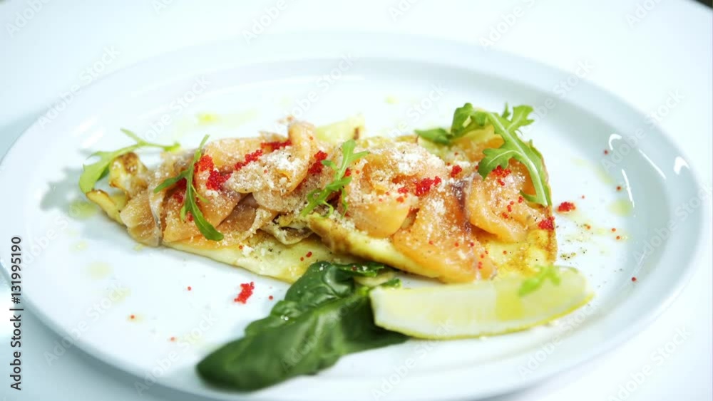 Pancakes with salted fish on a plate Pancakes with salted fish on a plate