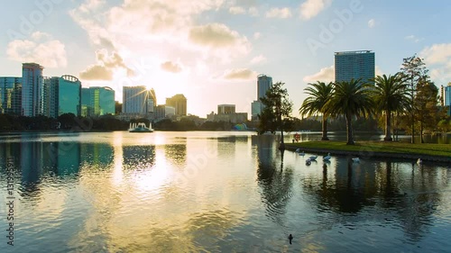 Sunset over the Eola lake, Eola Park, Orlando, Florida USA