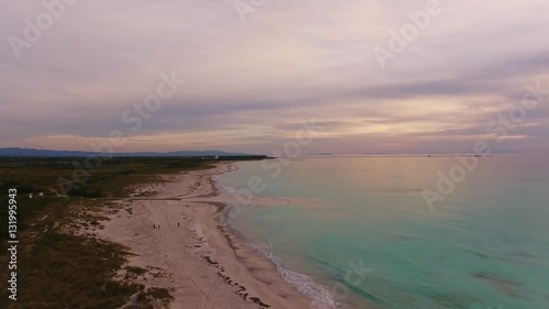 Wallpaper Mural Aerial shot, marvellous white beach on the sunset with beautiful clouds and very calm sea Torontodigital.ca
