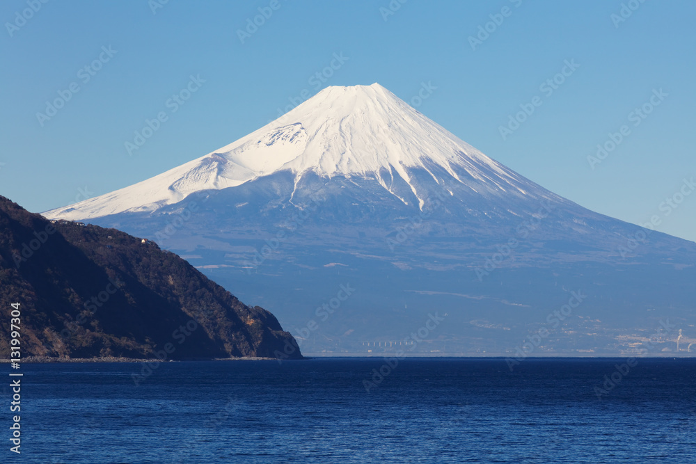 Mountain fuji and Japan sea in winter seen from Izu city , Shizuoka prefecture