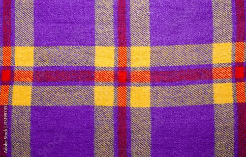 Violet, purple vintage blanket tartan plaid wth copy space, texture background
