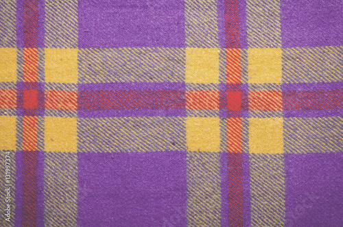 Violet, purple vintage blanket tartan plaid wth copy space, texture background