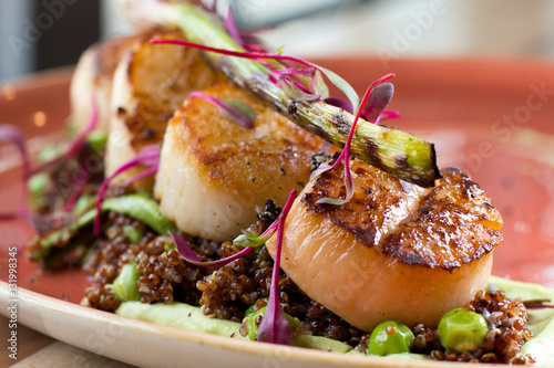 Canvastavla Seared  Jumbo Day Boat Scallops - English pea puree, glazed fiddle heads, grilled spring garlic, red quinoa, black garlic sea salt