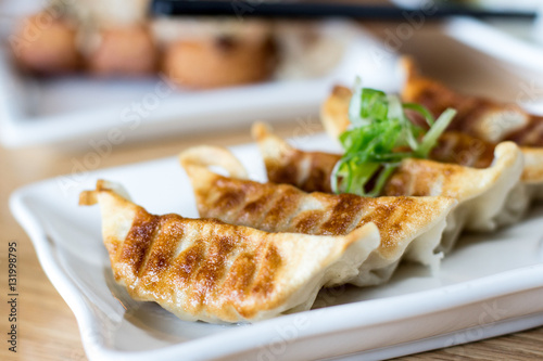 Photography Gyoza - Marinated pork and vegetable dumpling, pan fried or steamed