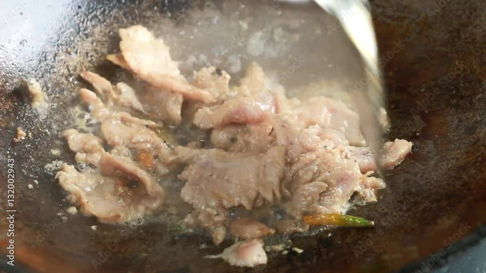 frying pork in pan