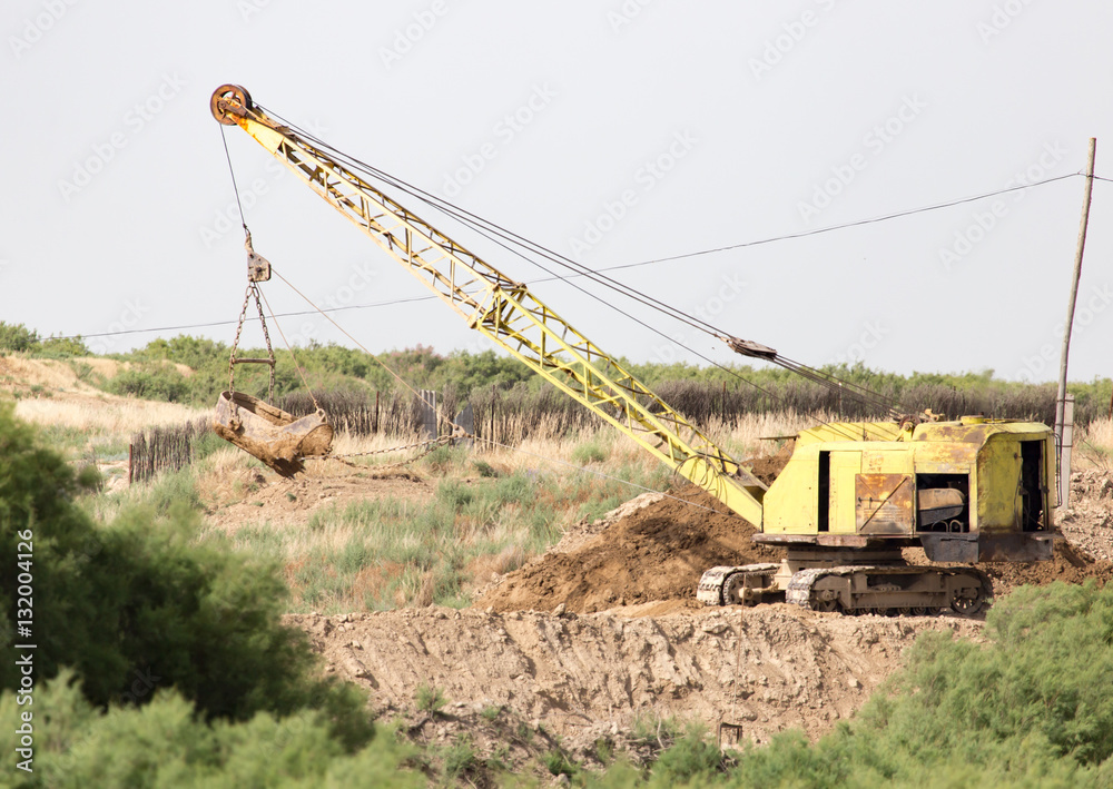 excavator digging a big bucket excavator digging a big bucket