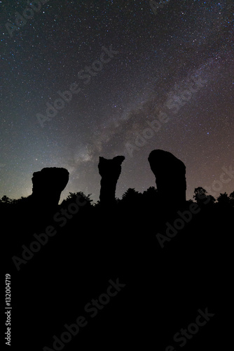 Silhouette stonehenge and milky way on background.Long exposure shooting and high iso used make this photo have noise © xreflex