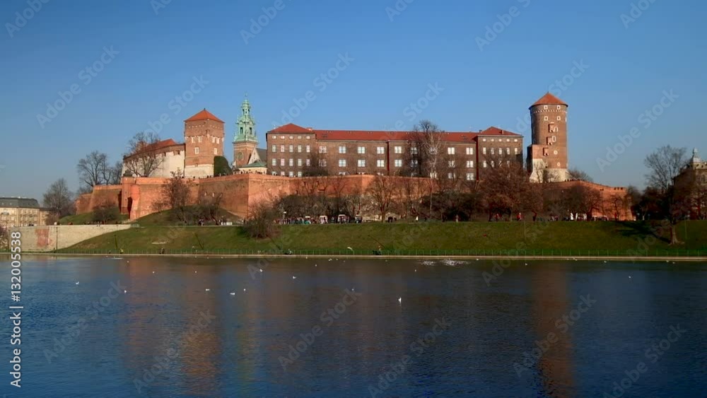 Famous landmark Wawel castle seen from Vistula, Krakow, Poland. Famous landmark Wawel castle seen from Vistula, Krakow, Poland.