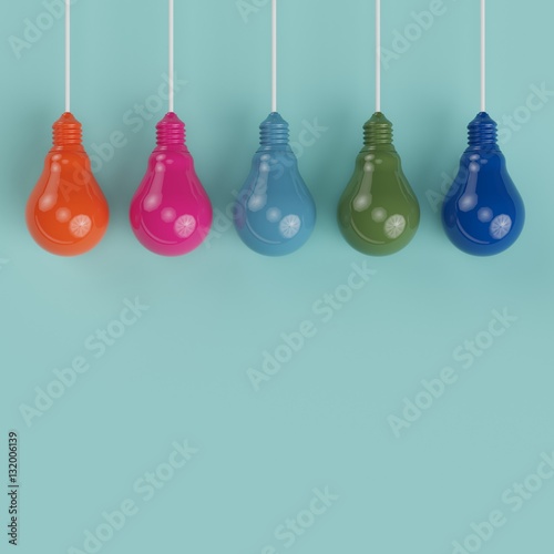Hanging colorful pantone pastel light bulbs different idea on light blue background , Minimal concept idea , flat lay , top