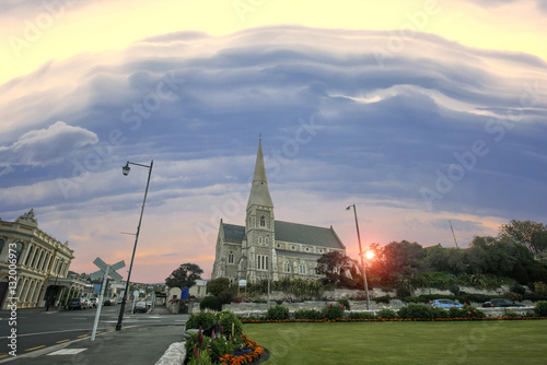 church building on the hill at sunset scenery