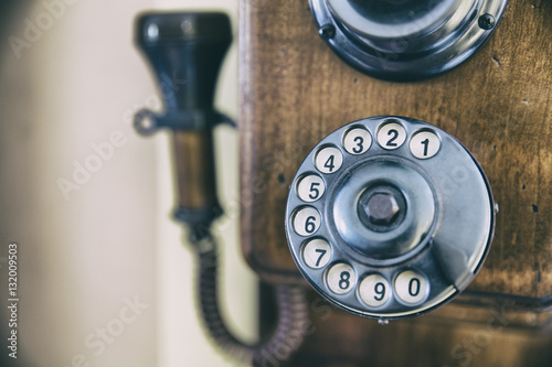 Numbers on wooden retro telephone photo