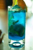 Glass with blue cocktail