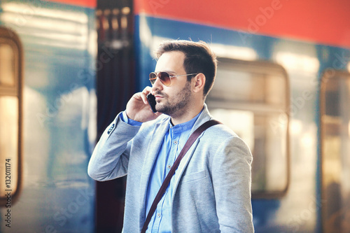 Businessman on rail station