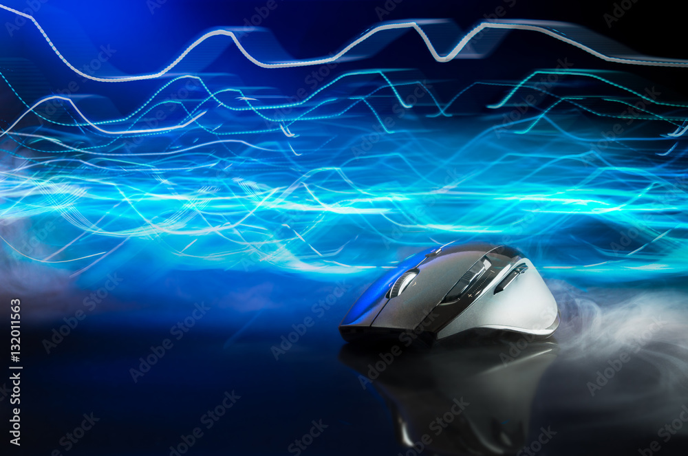 High technology computer gaming mouse in dark blue tone with stroke of lightning as background