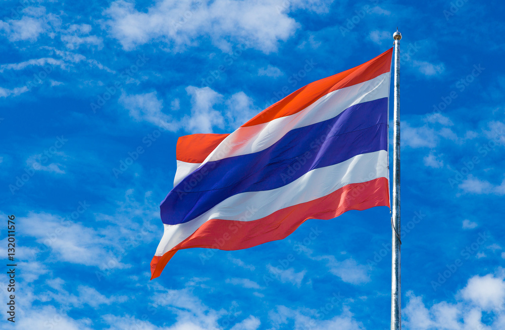 Thailand national flag on the flag pole against sky background