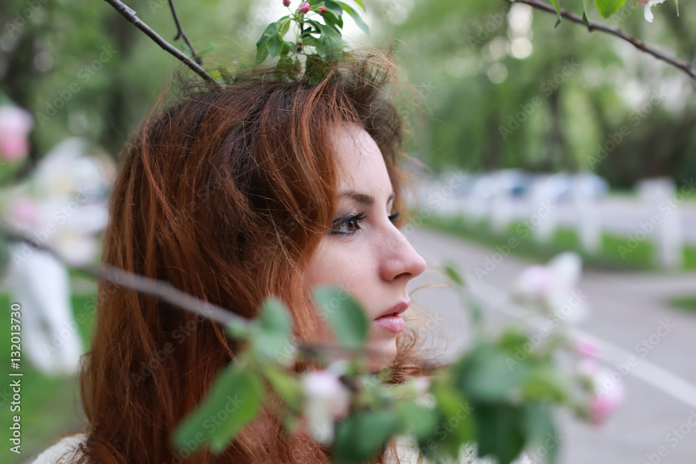 Naklejka premium women with branch apple flower