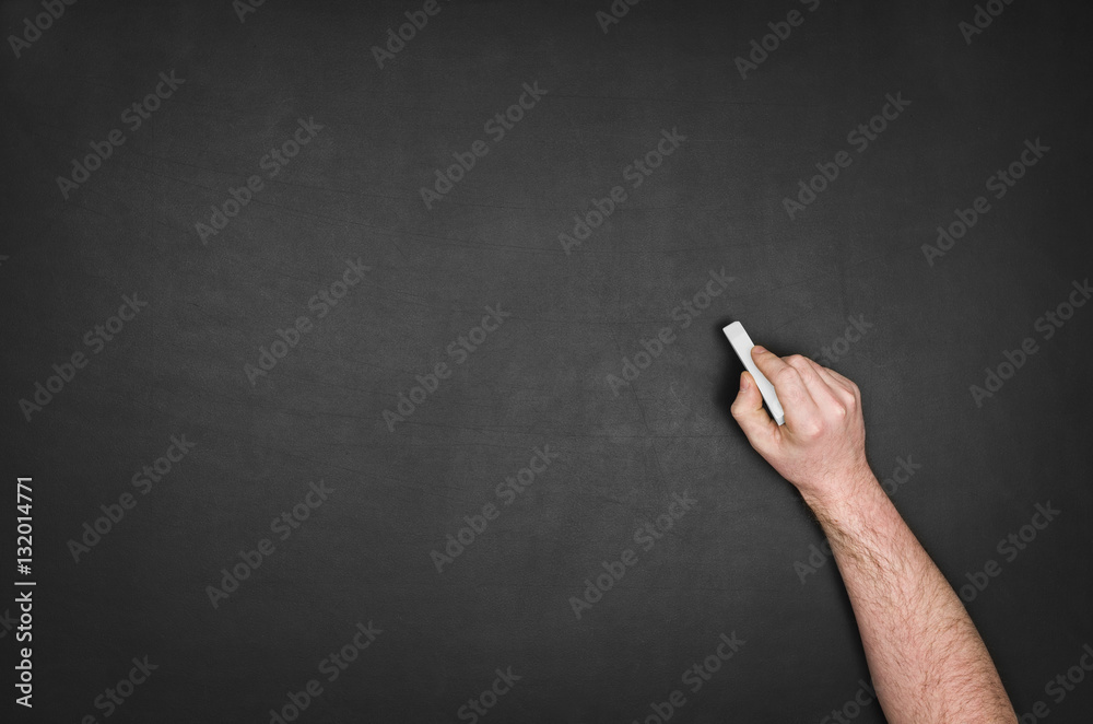 Hand drawing on a black blank chalkboard. Blackboard texture with room for text or drawing Hand drawing on a black blank chalkboard. Blackboard texture with room for text or drawing