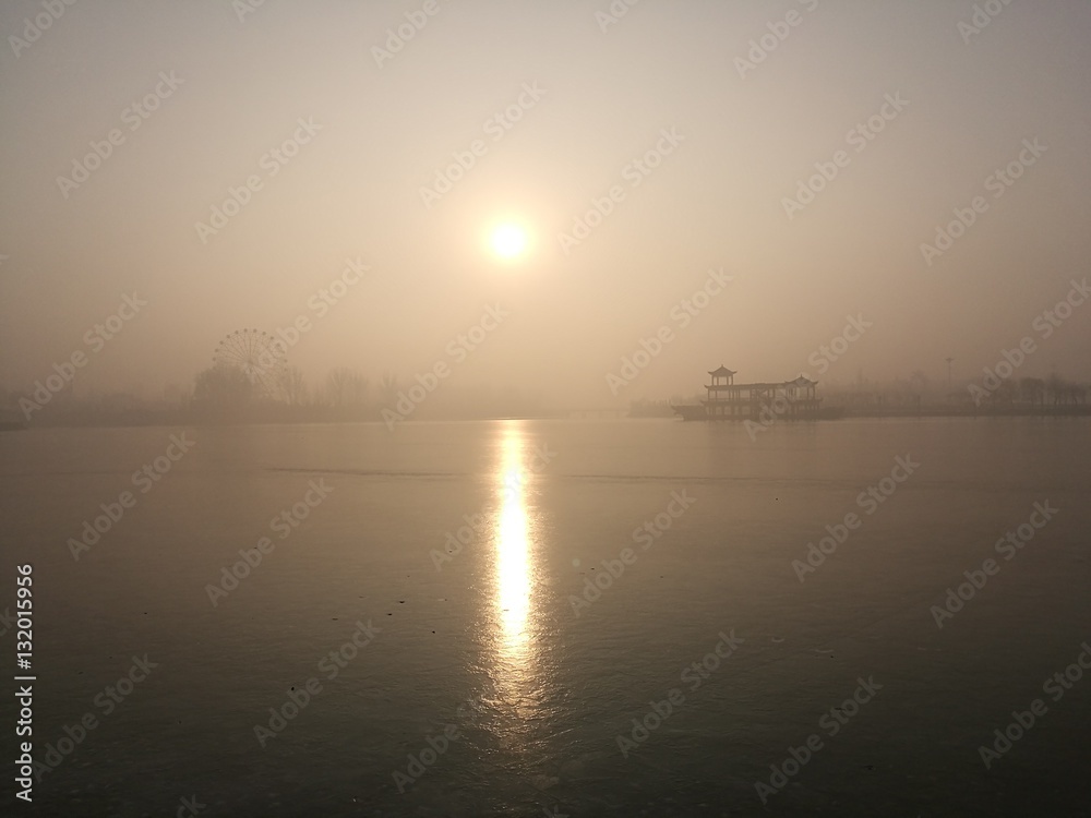 sunset and lake in frost