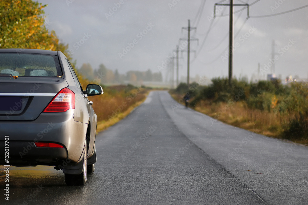 car on country road lane