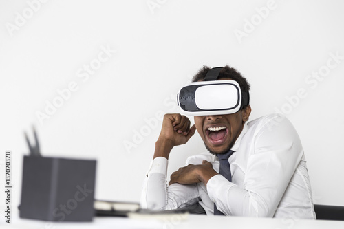 African American businessman in vr, scared