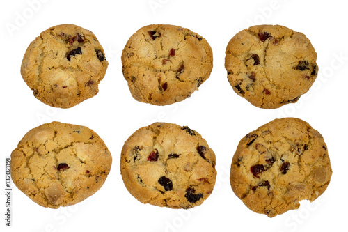 Six cookies with raisins isolated over white background