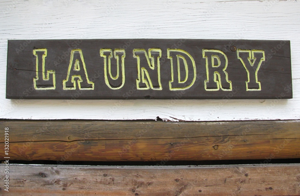 Laundry wooden sign attached to a wall Laundry wooden sign attached to a wall