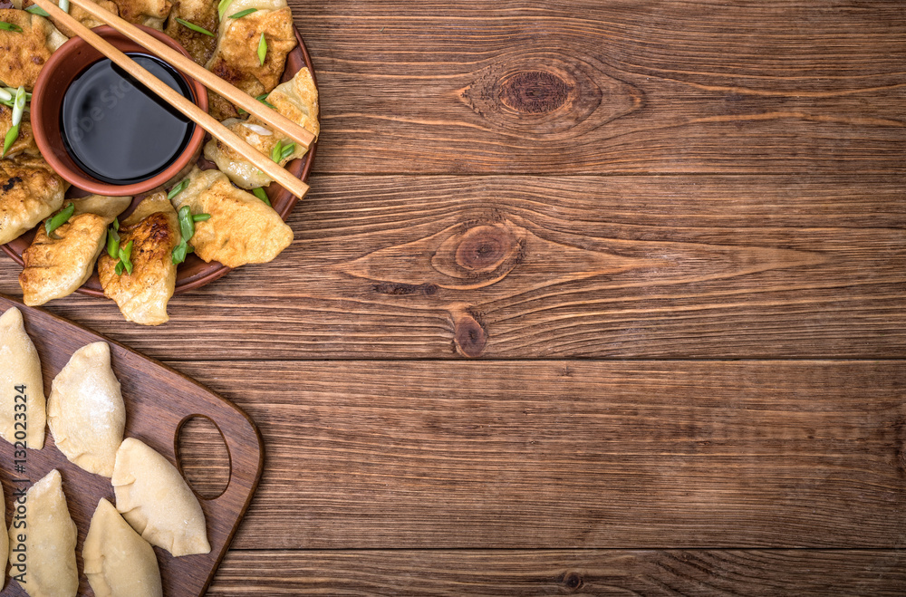 Homemade сhicken potstickers with soy sauce. Homemade сhicken potstickers with soy sauce.