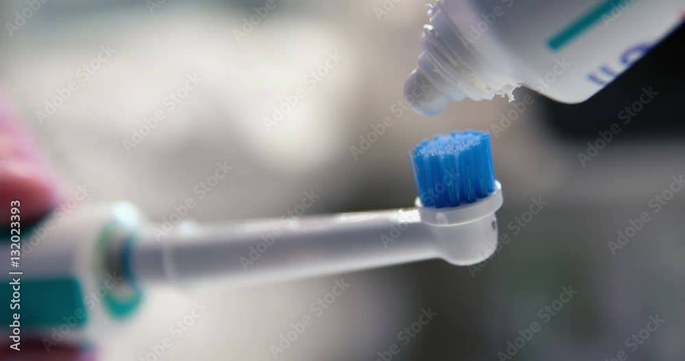 Tooth bush and tooth paste slowmotion