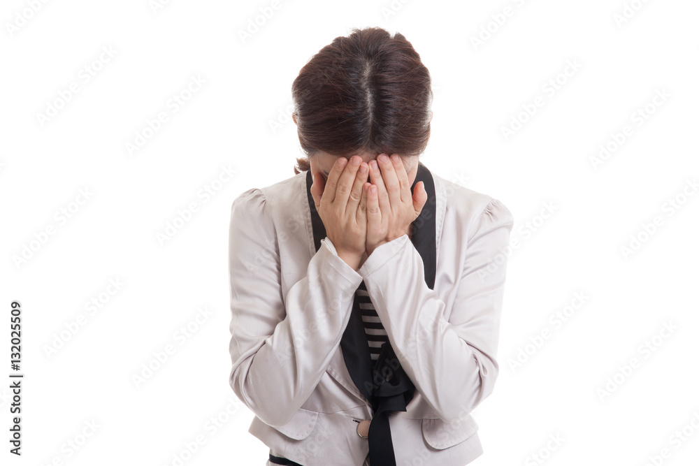 Sad young Asian businesswoman cry with palm to face. Sad young Asian businesswoman cry with palm to face.