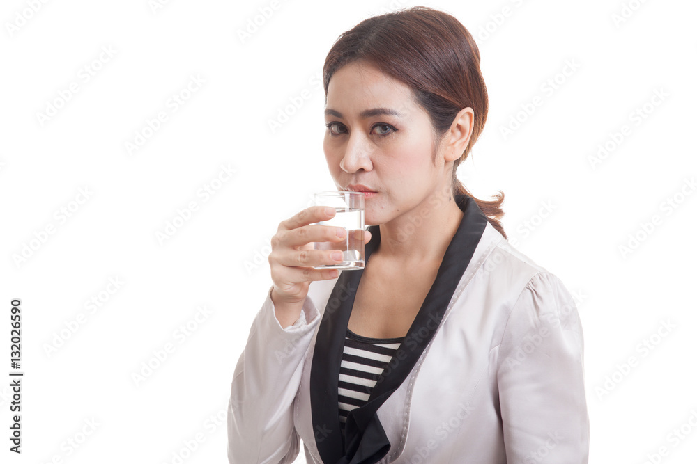Young Asian woman with a glass of drinking water. Young Asian woman with a glass of drinking water.