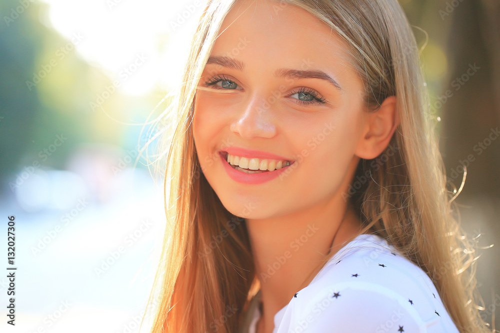 blonde cute girl on sunny day Stock Photo