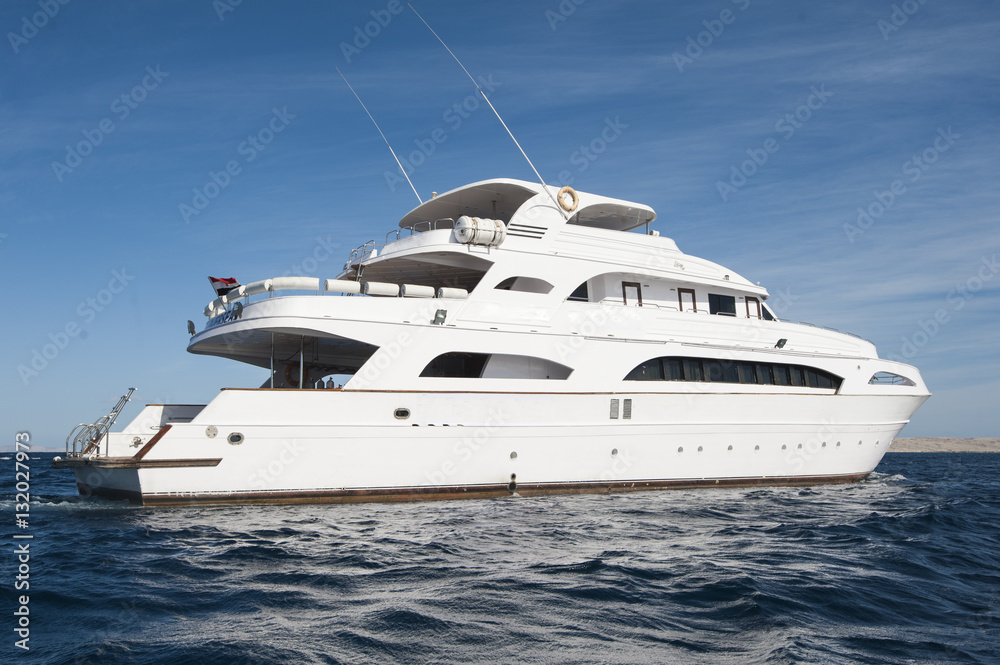 Large private motor yacht out at sea Large private motor yacht out at sea