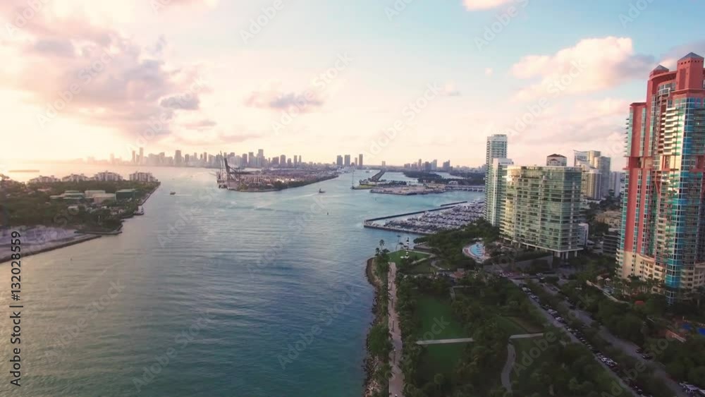 Flying over South Miami beach park toward Miami port and downtown over boats, Aerial view, Miami, Florida, USA Flying over South Miami beach park toward Miami port and downtown over boats, Aerial view, Miami, Florida, USA