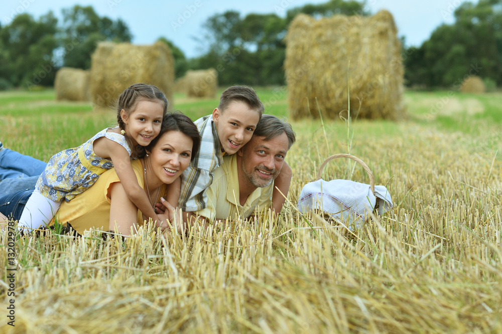 Fototapeta premium happy family at field