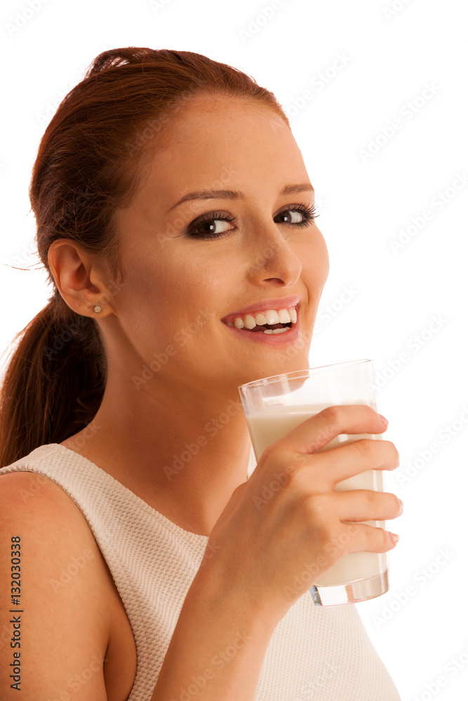 Woman drinking milk in the morning isolated over white backgroun Woman drinking milk in the morning isolated over white backgroun