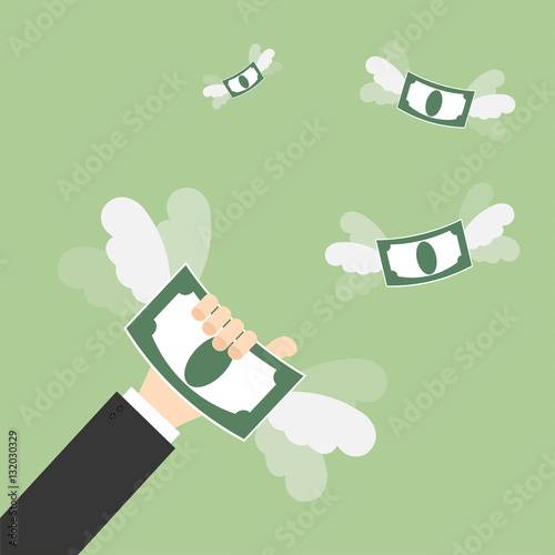 Hand catching a money fly. Business concept