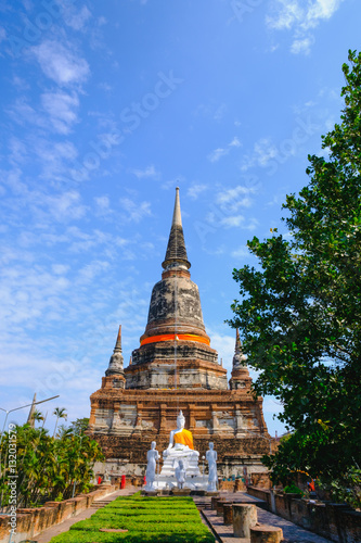 Old pagoda with Blue Sky background at Wat Yai Chai Mongkhon Old Temple in Ayutthaya Historical Park Thailand.