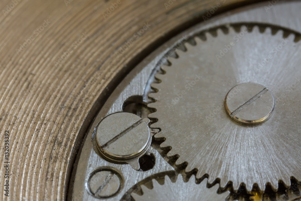Fototapeta premium Macro cog clockwork mechanism close up micro workings of watch with metallic wheel time precise motion & rotation