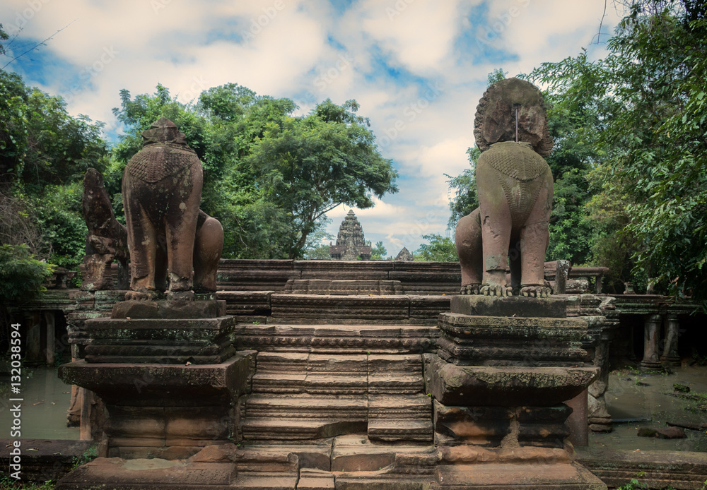 Simha, Singha stone statues as guardian of the place at Banteay Samre, Angkor, Cambodia