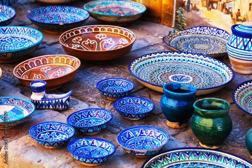 Plates and pots on a street market in the city of Bukhara, Uzbekistan
