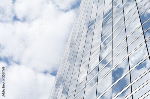 Reflection of clouds on a glass facade